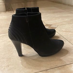 Black Suede all-weather heeled booties.